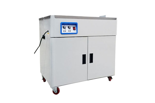 How does dual motor baler provide a solid solution for heavy product packaging?